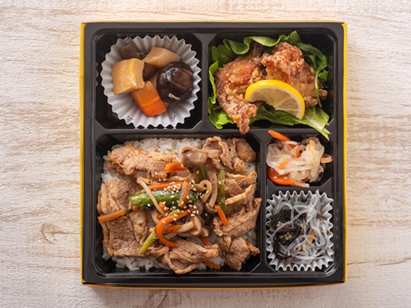 鶏の唐揚げと焼肉のせ弁当
