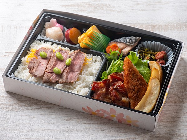 薄切りステーキと若鶏の香味焼き弁当